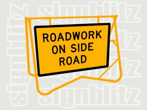 SWT1-25 Roadwork On Side Road Sign on Swing Stand CL1 Ref 900x600mm & 1200x900mm